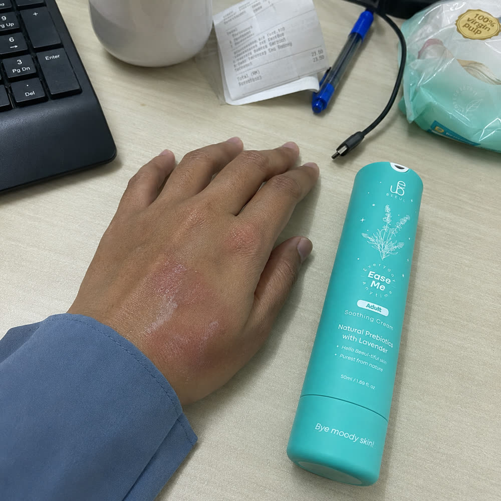The Ease Me tube on the corner of a work desk