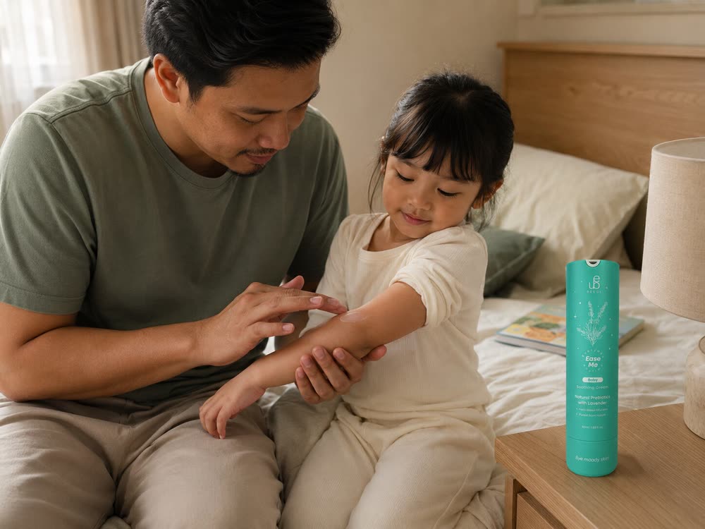 A parent settling a child at bedtime in a softly lit room